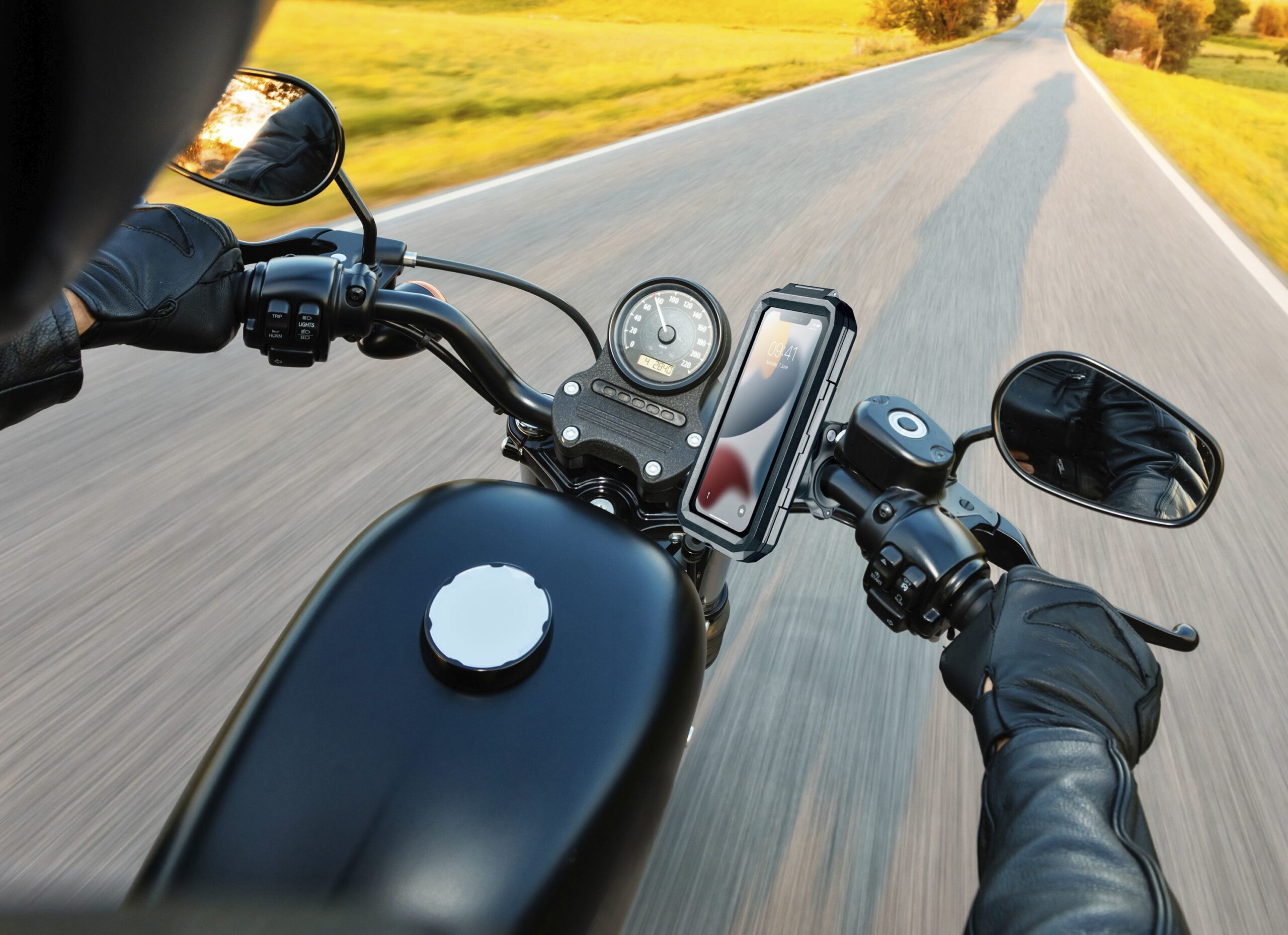 Motorcycle driver riding on motorway